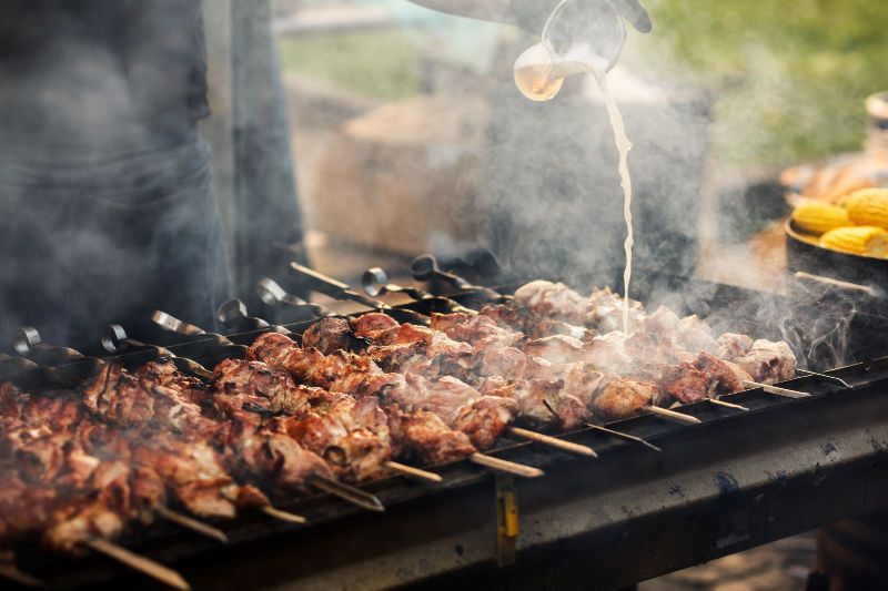 Putting Passion into Bringing the Heat: Oak Pit Catering's Red Oak Grilled Tri-Tip Steak and Smoked Brisket Ends Image